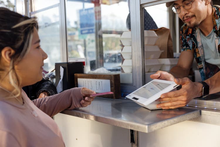 woman giving tip