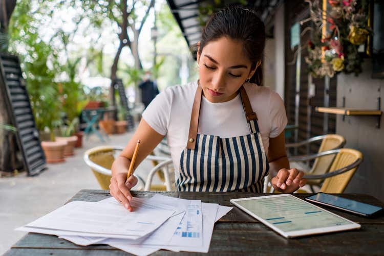 Small business woman doing bookkeeping