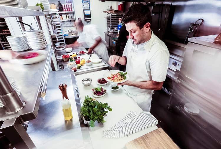 Chef plating food