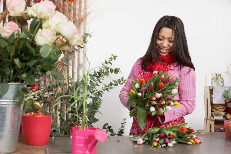 florist holding flowers