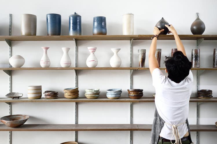 man cleaning store