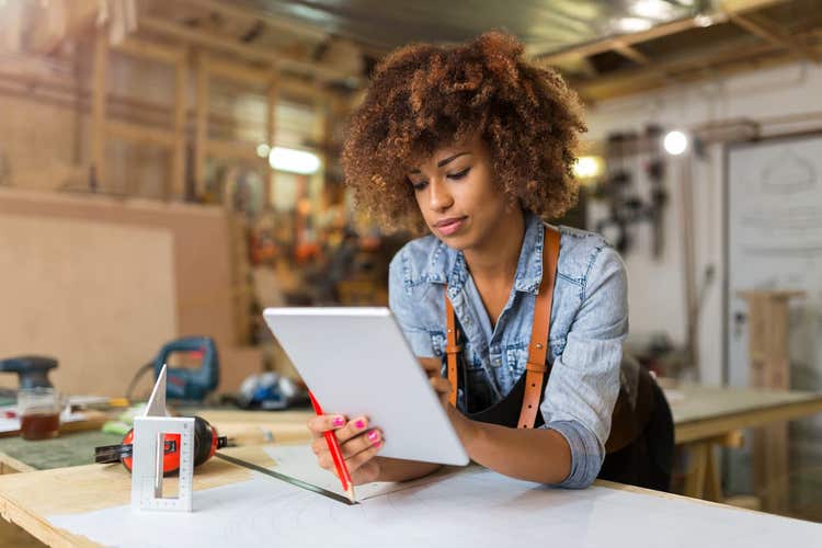 Woman looking at tablet