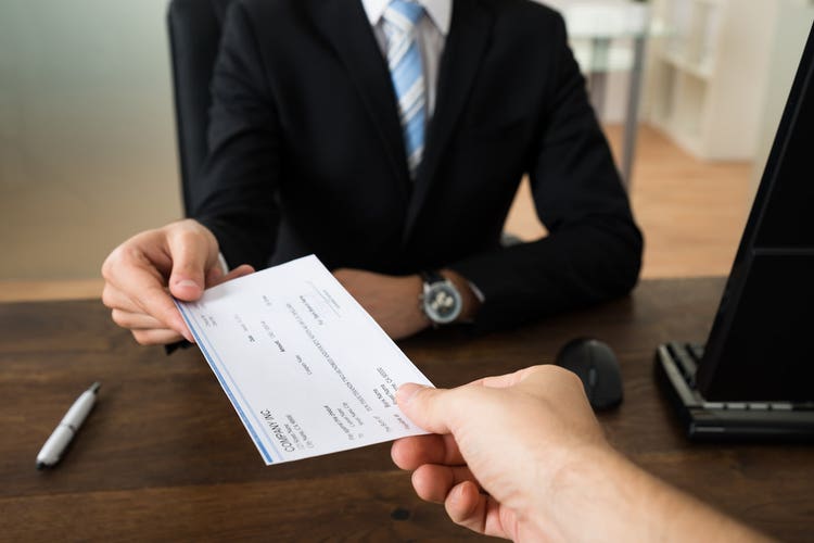 woman with cheque