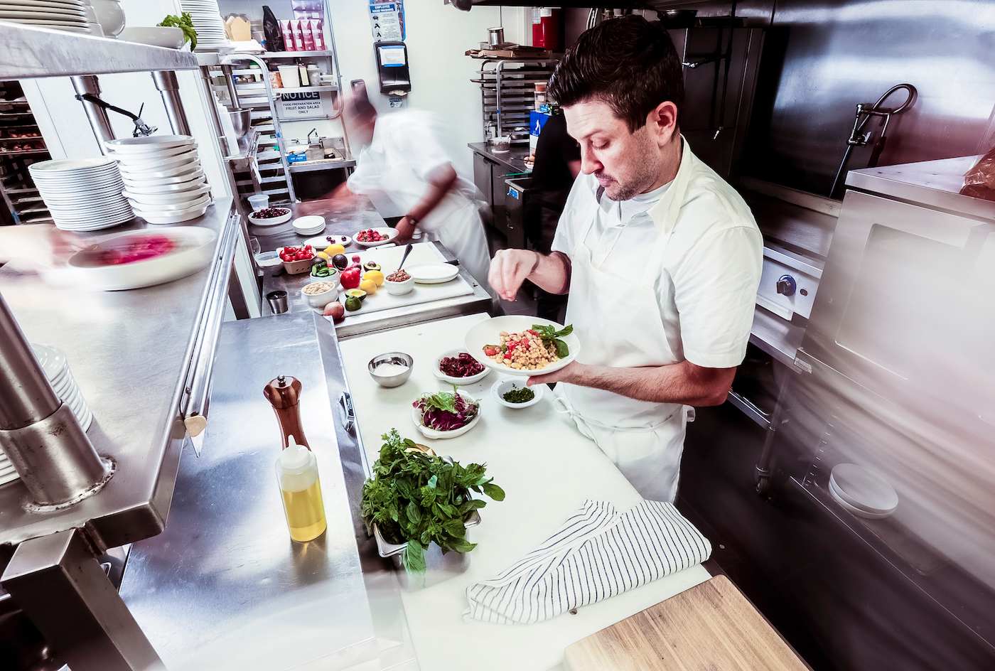 Chef preparing a meal at a restaurant
