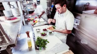 Chef plating food