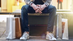 Man sitting with bags