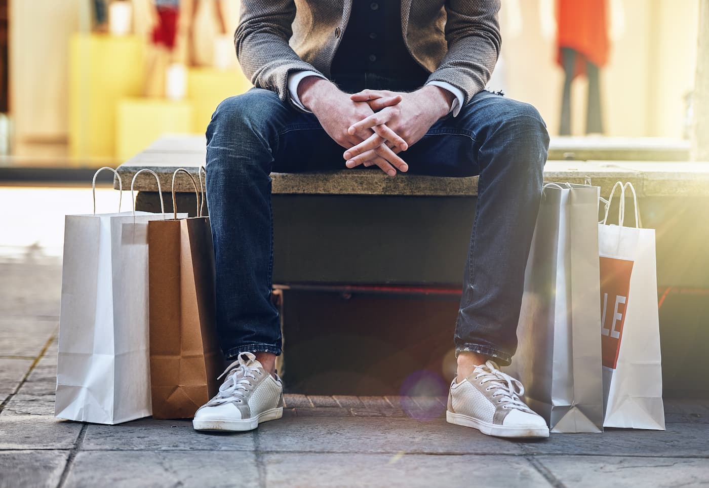 Man sitting with bags