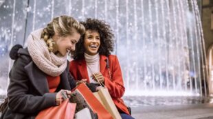 two women Christmas shopping