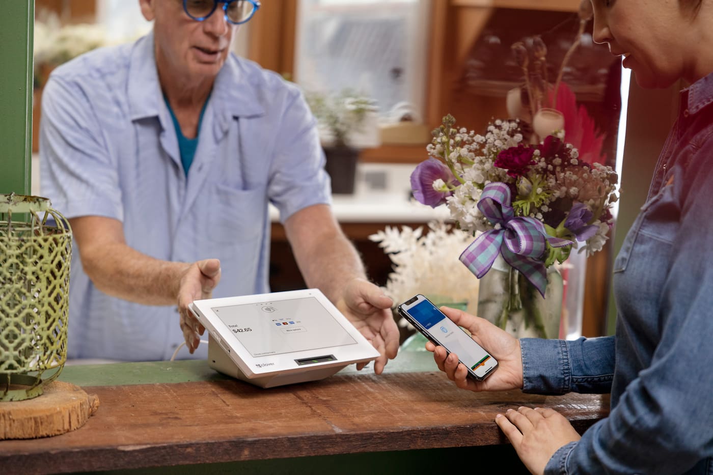 paying at flower shop