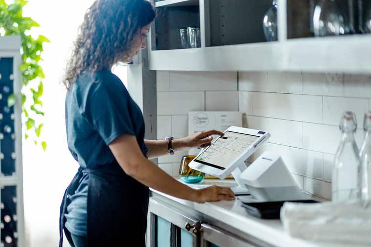 Restaurant server standing at Station Solo