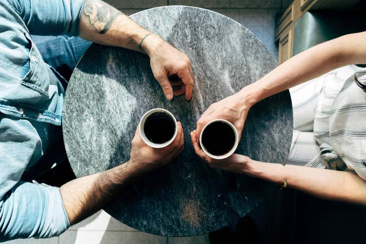 Two people having coffee