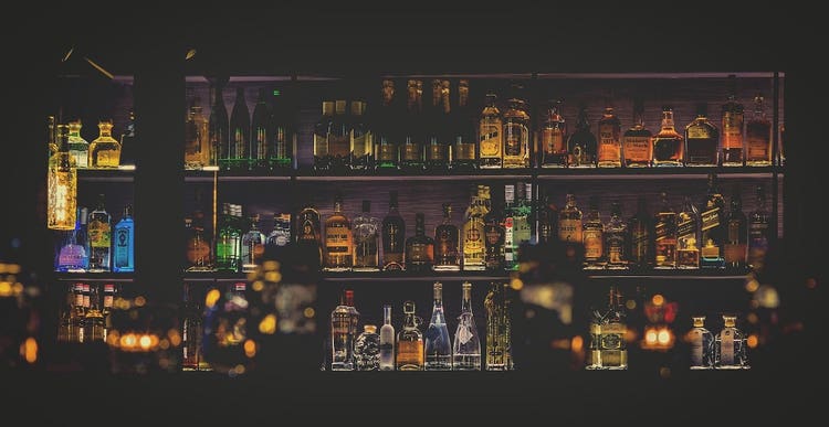 Shelves with liquor bottles