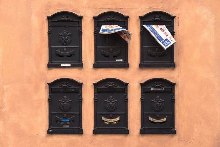 Six mailboxes on a wall
