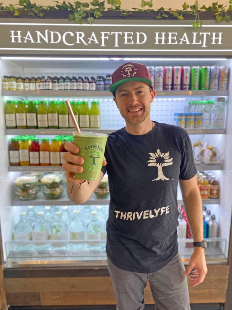 Cole Carson holding smoothie