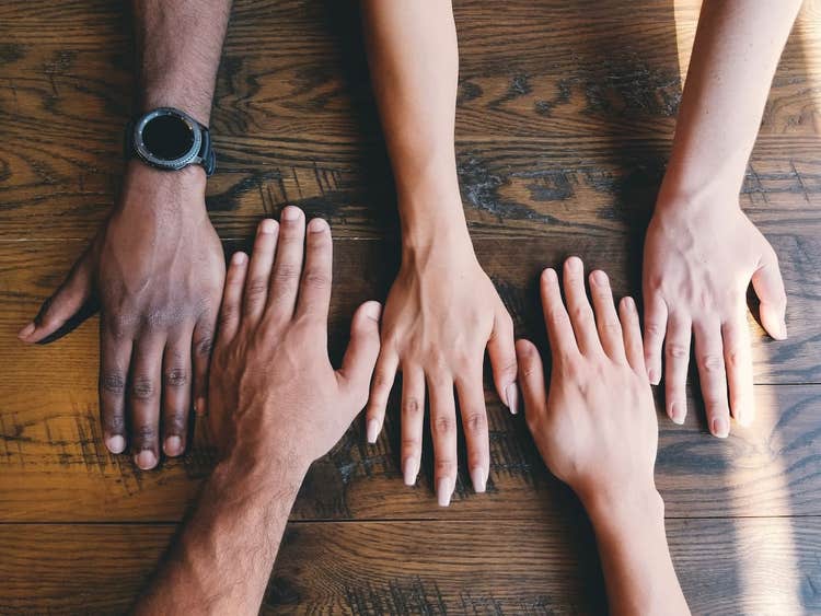 Image of hands representing teamwork