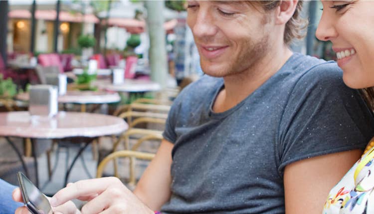 Couple looking at phone