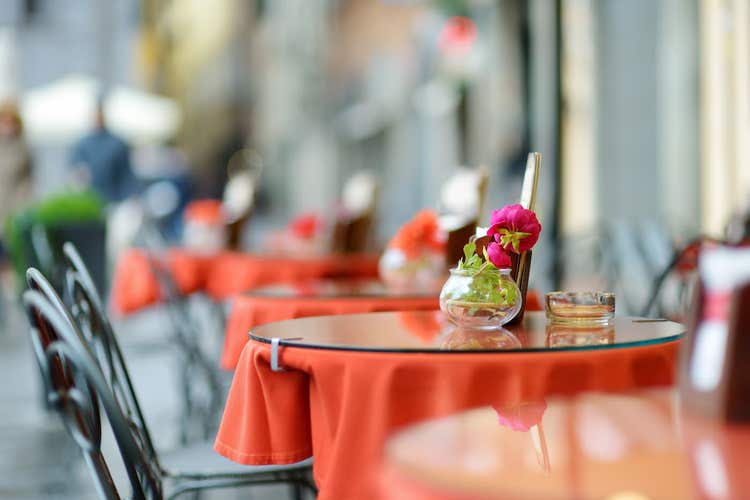 Empty tables at outdoor cafe