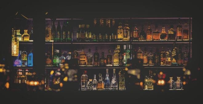 Shelves with liquor bottles