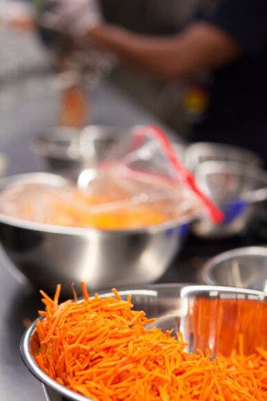 Shredded carrots in a bowl