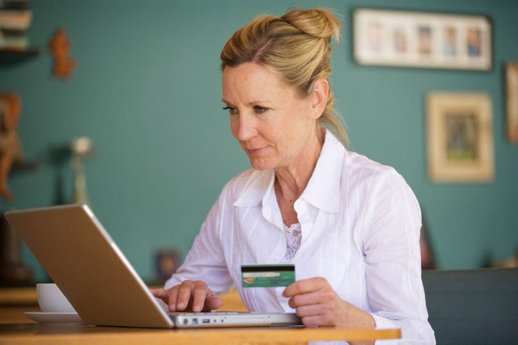 Woman holding credit card
