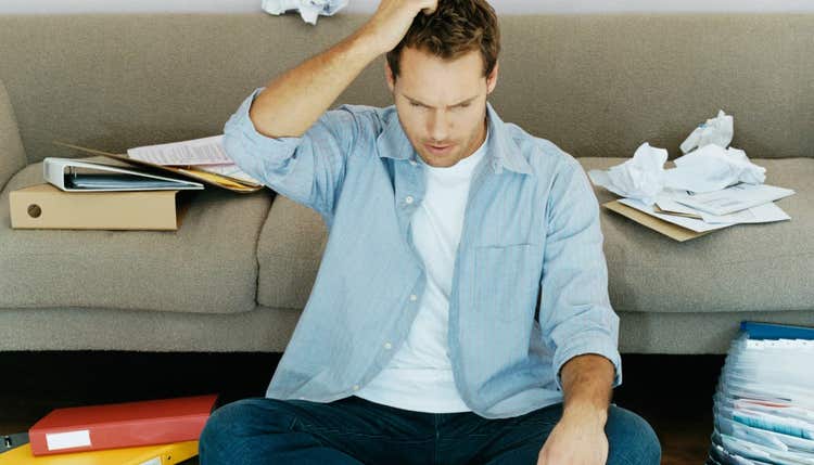 Man scratching his head