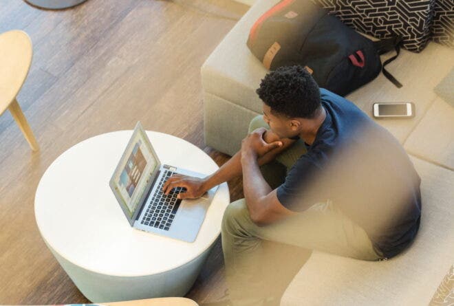 Man looking at laptop