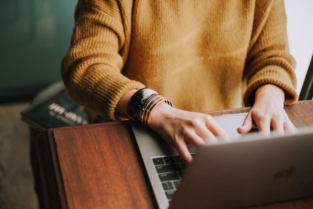 Image of employee at laptop