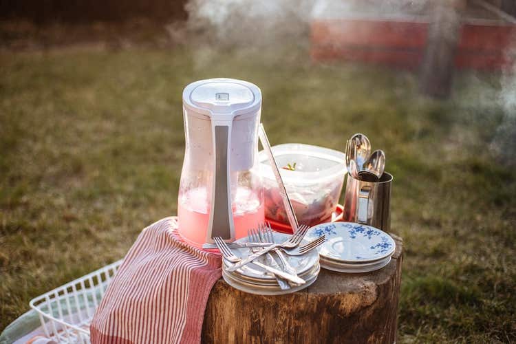 Pitcher of lemonade and strawberries