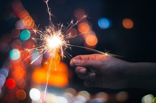 Hand holding sparkler