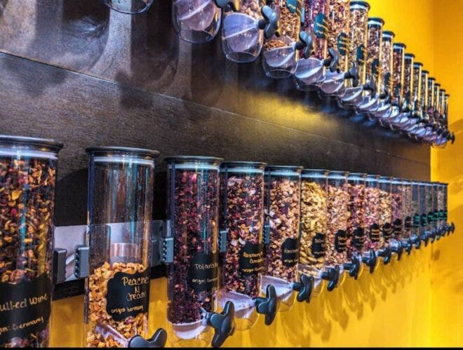 Interior of the Tea ParTea shop with tea dispensers on the wall
