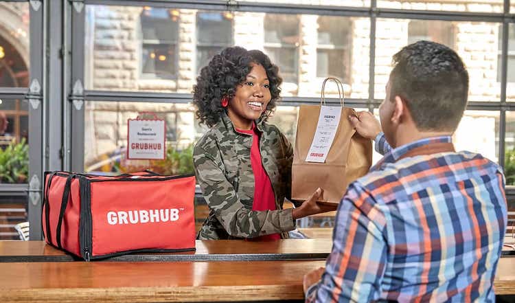 Grubhub delivery person receiving order