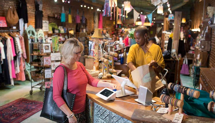 Customer at checkout counter