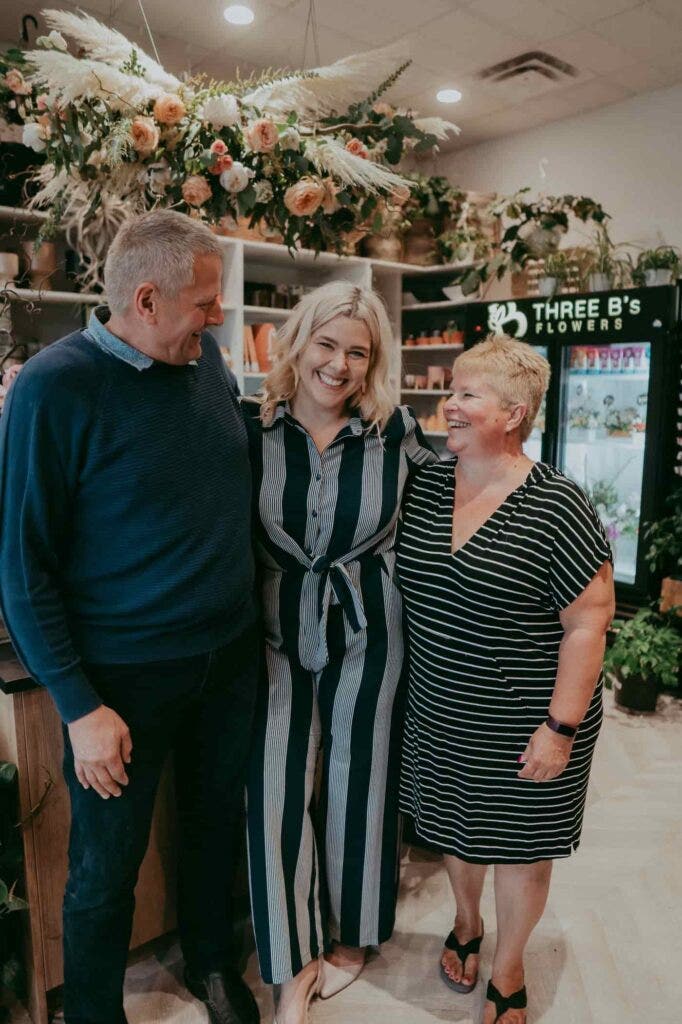 Owner of 3B's Flowers with her entrepreneur parents