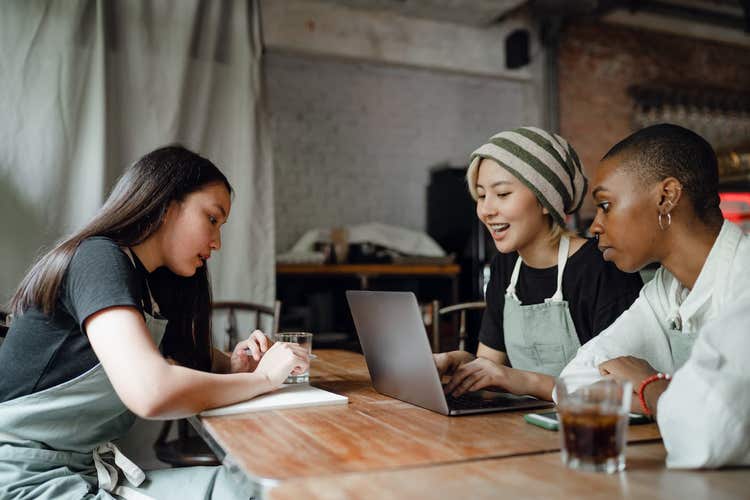 Three restaurant employees in a meeting