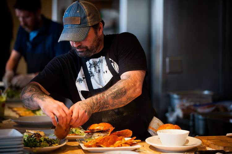 Chef plating burgers