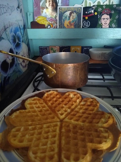 Heart-shaped waffles on a stovetop