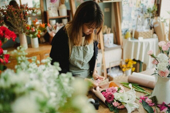 Florist working on an order in her shop