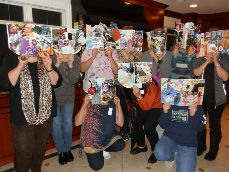 Art as Therapy workshop participants with the collages they've made