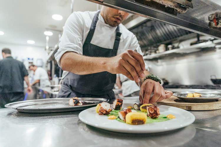Chef plating a dish