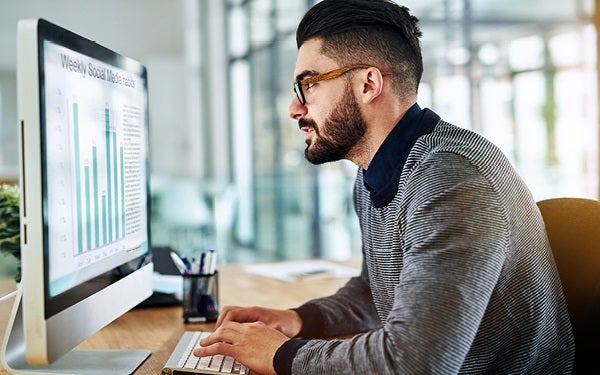 Man checking social media stats