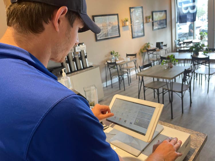 Phillip Ingram using Clover Station POS
