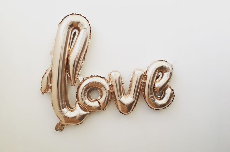 Gold mylar love balloon