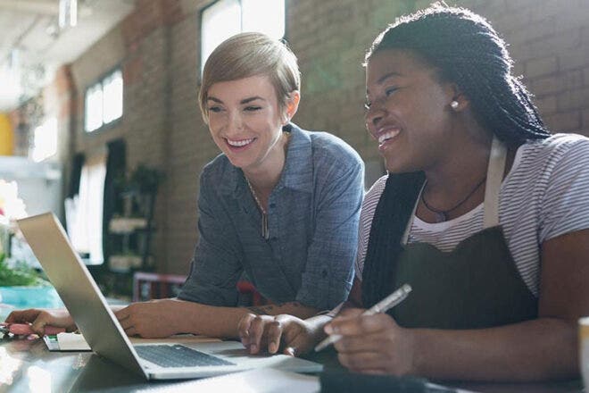 Women looking at laptop