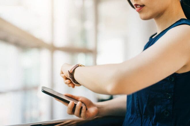 Woman looking at watch