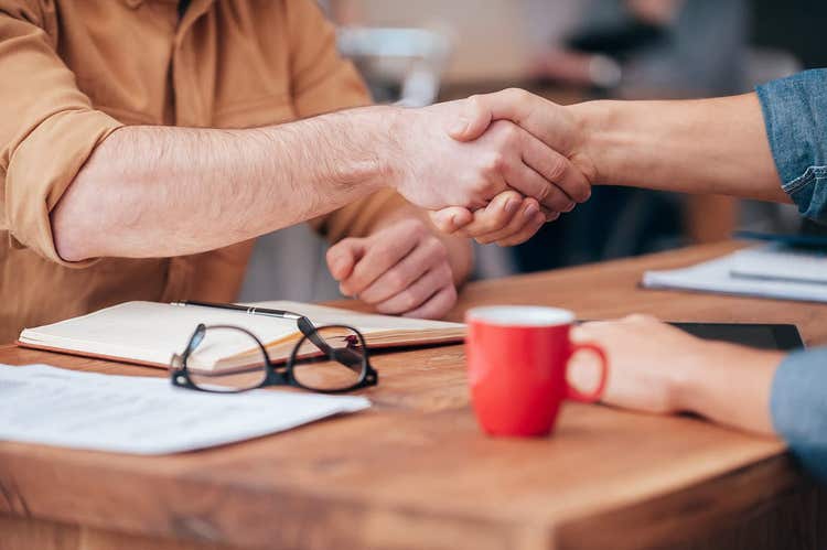 Two people shaking hands