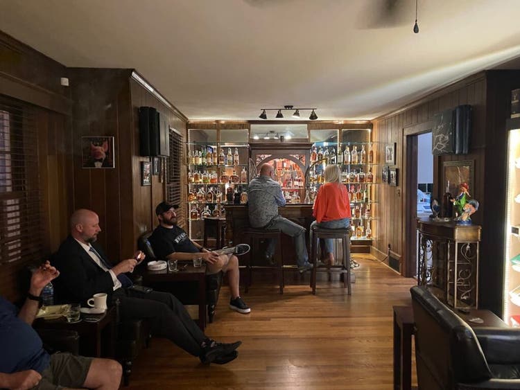 People sitting inside The Smoke and Oak