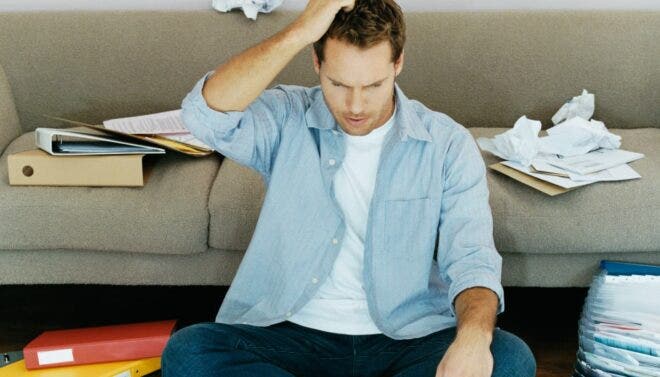 Man scratching his head