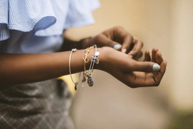 Woman wearing several bracelets