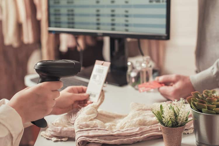 Barcode scanner scanning price tag