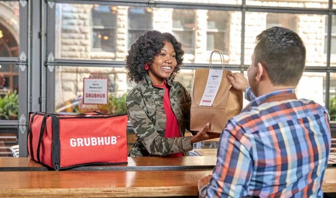 Grubhub delivery person receiving order